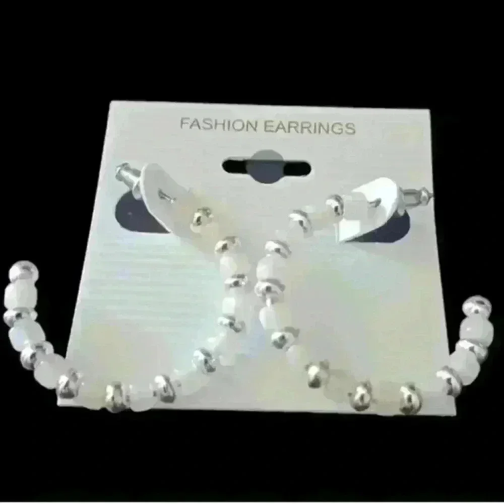 Silver and white beaded hoop earrings